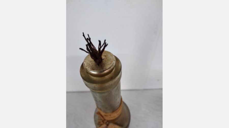 Candeeiro a óleo em garrafa