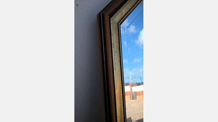 Espelho com mais de 40 anos em bom estado
